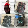 Christopher Mens Designer Ryggsäck X Yayoi Kusama stor kapacitet Handväskor Infinity Dots Travel Bag Canvas Leather Totes Camping BA231R