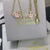 Planeet ketting Designer ketting voor dames Vivienen Luxe sieraden Viviane Westwood Limited Edition 23 jaar Anxi dubbelzijdig emaille lachend gezicht ketting voor dames