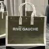 Rive gauche tote randig duk axelväskor designer kvinna handväska mode linne strandväskor broderade halm crossbody stor ca256b