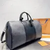 sac de sport design Hommes et femmes sac de voyage de mode classique sac à main de grande capacité sac de voyage en cuir enduit imprimé classique sac d'embarquement de haute qualité