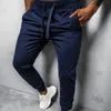 Pantalon pour hommes confortable Hip Hop à lacets manchette de piste entraînement de couleur unie avec poche