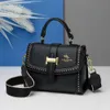 Luxury Handväskor Kvinnor Väskor Designer Högkvalitativa damer axelväskor Fashion Lock Rivet Ladies Crossbody Väskor 2023 SAC A Main