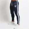 Pantaloni vendita calda solido casual uomo casual slim fit tuta sportiva solido maschio palestra cotone skinny jogging pantaloni casual pantaloni