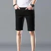 Pantaloni da uomo Pantaloncini di jeans tinta unita estivi Versione coreana della tasca dei pantaloni con fondo medio a cinque punte di tendenza