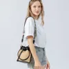 Bolsas de noite Bolsa de palha artesanal para mulheres com uma sensação de luxo nicho balde crossbody ombro de deslocamento