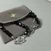 女性のための惑星ネックレスデザイナーネックレスVivienen Luxury Jewelry e Westwood S Full Diamond Saturn Black Agateネックレス