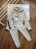 Designer nieuw tech fleece trainingspak heren Sportset jogger trainingspak Capuchon Letterdruk nieuw seizoen Sportkleding set comfort Effen trainingspak techfleece