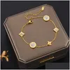 Charm Bracelets Snap Up Designer Bangle Four Leaf Clover Elegant Fashion 18K Gold Agate Shell Chain Birthday Party Perfect Gift Drop Dh3Y5