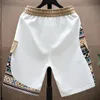 Summer Męskie spodnie Koreańskie spodnie do koszykówki mody swobodne odzież męskie białe retro graficzne spodnie sportowe nowe 240223