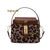 Sacos de noite Bucket Bag Womens Portátil 2024 Novo Padrão de Leopardo Designer Bag Mil Pássaros Treliça Um Ombro Messenger Bag Coreano Lingge Fashion Bag