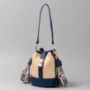 Bolsas de noite Bolsa de palha artesanal para mulheres com uma sensação de luxo nicho balde crossbody ombro de deslocamento