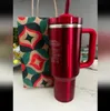 US Stock Holiday Red Tumbler Quencher H2.0 40oz rostfritt stål tumlar koppar silikonhandtag lock vinterrosa bil muggar vattenmelon moonshine svart krom gåvor