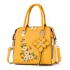 Schoudertas met bloemendetail Trendy handtas met ritssluiting voor werk Casual crossbodytas Damestas met bloemendecor