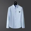 Designers en gros Hommes Chemises décontractées Qualité Designer Business Tees Classique Chemise à manches longues Lettre de couleur unie Printemps Automne Blouse Plus Taille S / M / L / XL / 2XL / 3XL / 4XL