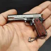 Vollständige Serie Metallpistole Spielzeug Hochsimulationspistolenmodell abnehmbar G17 M1911 Desert Eagle M92F Kostenlos zusammenbaubare Legierungspistolen Schlüsselanhänger Geschenk für Jungen Erwachsene AF2066