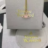 Planeet ketting Designer ketting voor dames Vivienen Luxe sieraden Viviane Westwood Limited Edition 23 jaar Anxi dubbelzijdig emaille lachend gezicht ketting voor dames