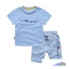 Set di abbigliamento Abiti estivi 0-13 anni Ragazzi Ragazze Lettera di marca stampata 100% cotone Arancione T-shirt Pantaloncini sportivi 2 pezzi Comodo per bambini Dh3C6