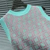 Nowy styl Baby Kids Designer Ubrania Spring Autumn Dzieci Dziewczyny Stroje Krótki rękaw dzianina Top Sweter i pełna litera spódnica 2pcs Zestaw ubrania dla dzieci