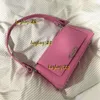 Bolsas de noite Bolsas de ombro Bolsa de designer Saco de luxo Pequeno Livro Vermelho Net Mesmo Couro Brilhante Rosto Brilhante Um Ombro Bolsa de Axila Pequena Praça 2024 Novas Mulheres