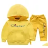 Kläder sätter barn baby pojkar flickor märke tryck hoodies casual stil lös svettbyxor vårtoppar barns droppleverans barn mat dhru2