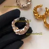 Stud Français Vintage Irrégulier Plissé Designer Corne De Vache Sac Oreille Goujons Femmes Minorité Conception Haute Qualité Lumière Luxe Charme Boucles D'oreilles De Luxe Bijoux 2024