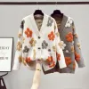 Lente en herfstmode nieuwe dames gebreide lange mouwen v-neck trui vorst Jacket vrouwen losse westerse stijl jacquard bloem single breasted