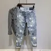 Pantaloni jeans da uomo Pantaloni da cowboy da uomo elasticizzati con stella con stampa Grafica hip-hop elastica 2024 Moda larga stile coreano Taglie forti