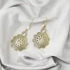 Boucles d'oreilles pendantes couleur antique en alliage de zinc incrusté de strass creux vintage pour femmes produits tendance fleurs forme bijoux pour filles