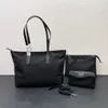 Senaste 21 Tote Shopping Bag Luxury Designer Herr- och kvinnors universella shoppingväska stor kapacitet Tre stycken Set Mother Mother's Bag