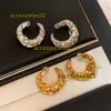 Stud Français Vintage Irrégulier Plissé Designer Corne De Vache Sac Oreille Goujons Femmes Minorité Conception Haute Qualité Lumière Luxe Charme Boucles D'oreilles De Luxe Bijoux 2024