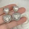 Pendientes CH 23 de diseñador para mujer, aretes de lujo, accesorios de joyería de nácar y perlas, pendientes colgantes C