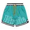 Designer Designer Shorts Rhude Shorts Mens Capsule Shorts Summer Beach Pants Mesh Material Andningsbar Svett Löst fitness basketbyxor Mens korta röda shorts Si