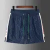 Projektanci męscy Designerowie Shorts Summer Men Beach Spodnie swobodnie projektantki krótka moda sportowa Szybka suszona czarno -biała azjatycka rozmiar lol designeraoew