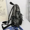 Sacos escolares moda meninos e meninas crianças camuflagem fábrica venda direta mochila de viagem crianças grande capacidade faculdade