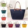 2024 Large Capacity Dumpling Bag Folding Shoulder Bag Fashion Classic Nylon Storage Womens Bag Canvas Bag Shopping Bag