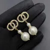 2024 New Women Designer Earrings Fashion Gourd Twist Pearl Letter Earrings 18K Gold Diamond c Letter Pearl Jewelry Gifts