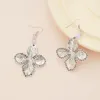 Boucles d'oreilles pendantes en alliage de mode coréenne incrusté de strass créatif trèfle à quatre feuilles pour femmes luxe personnalité tempérament filles bijoux