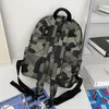 Sacos escolares moda meninos e meninas crianças camuflagem fábrica venda direta mochila de viagem crianças grande capacidade faculdade