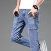 メンズジーンズ秋の冬の男性フリース濃いストレートソリッドストリートウェアファッションゆるい多用途の複数のポケットシックカジュアルパンツ