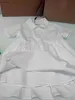 Nova menina vestido branco puro bebê saia plissada tamanho 100-140 crianças roupas de grife voltar logotipo impressão manga curta criança vestido 24feb20
