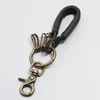 Keychains äkta läderficka för bilnycklar Ring Clip Mini Purse Holder Real Cowhide Keychain Women Men Accessories Handmade 2024 Gift