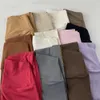 Leggings para mujeres Pantalones de yoga de color sólido Pantalones de la cintura Mujeres deportivos