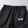 Designer masculino shorts shorts baús de natação de nado algodão estampado de cordão e forro de malha de malha relaxada casual massaceiro de banho rápido seco