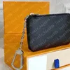 Com caixa laranja bolsa de chave de couro real famoso designer clássico feminino porta-chaves bolsa de moedas pequeno couro preto saco de bens