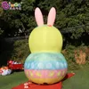 Publicidad de Pascua Inflable Pato encantador con orejas de conejo Inflación Modelo animal de dibujos animados Huevos soplados por aire Explotar Evento Decoración de fiesta