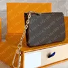 Com caixa laranja bolsa de chave de couro real famoso designer clássico feminino porta-chaves bolsa de moedas pequeno couro preto saco de bens