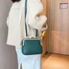 女性のファッションハンドバッグ電話財布ボルサレディースクロスボディバッグ韓国スタイル2021新しい女性メッセンジャーバッグキスロックsac a M2010
