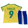 1994 Kit per bambini brasiliani Kit calcio Jereys Romario 1998 Ronaldo Roberto 2002 Ronaldinho 2004 Robinho Casa di calcio Shirt a manica corta divise