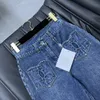 Jeans de diseñador 2024 Nueva primavera verano Moda Flare Paneles Marca Mismo estilo Pantalones Ropa de mujer de lujo 0225-7