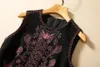 Europäische und amerikanische Damenbekleidung 2023 Herbst neues Rundhals ärmellose Stickerei schwarz Mode Faltenkleid XXL